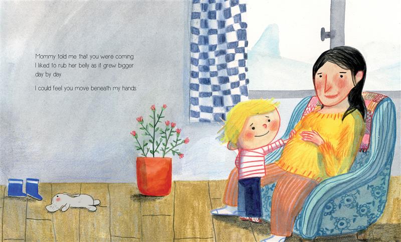  A child stands in front of his mother, who sits in a blue flowered armchair, and gently touches her belly with his hand. Both have light skin tone. The child has blond hair, a red-and-white striped shirt, and blue pants, and his mother has black hair, a yellow sweater and orange pants. A stuffed elephant lies on the floor on the left side of the page. Text: Mommy told me that you were coming. I liked to rub her belly as it grew bigger day by day. I could feel you move beneath my hands. 