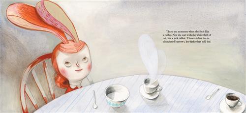 A round table has teacups on saucers and small spoons on it. A girl with red hair sits at the table. She has two long red ears that sit up straight on the top of her head. Text: There are moments when she feels like a rabbit. Not the sort with the white fluff of tail, but a jack rabbit. Those rabbits live in abandoned burrows, her father has told her. 