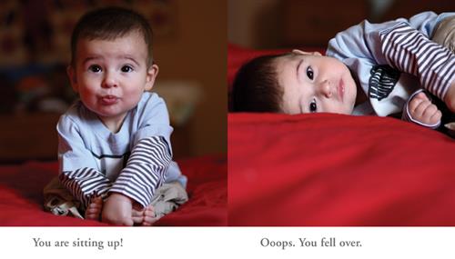  This image is a double page spread. To the left is a photograph of a baby with light skin tone and brown hair sitting on a red sheet. Text: You are sitting up! To the right is a photograph of the baby lying down on the red sheet. Text: Oops. You fell over. 